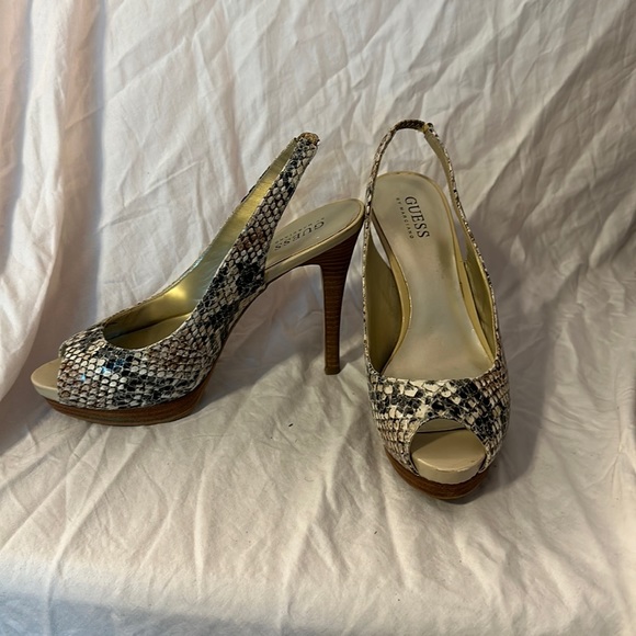 Gently used heels by Marciano snakeskin with platform